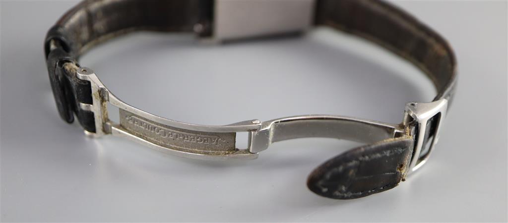 A ladys stainless steel Jaeger LeCoultre Reverso quartz wrist watch, on leather strap with Jaeger LeCoultre buckle,
